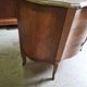 Curved chest of drawers in rosewood and marble marquetry