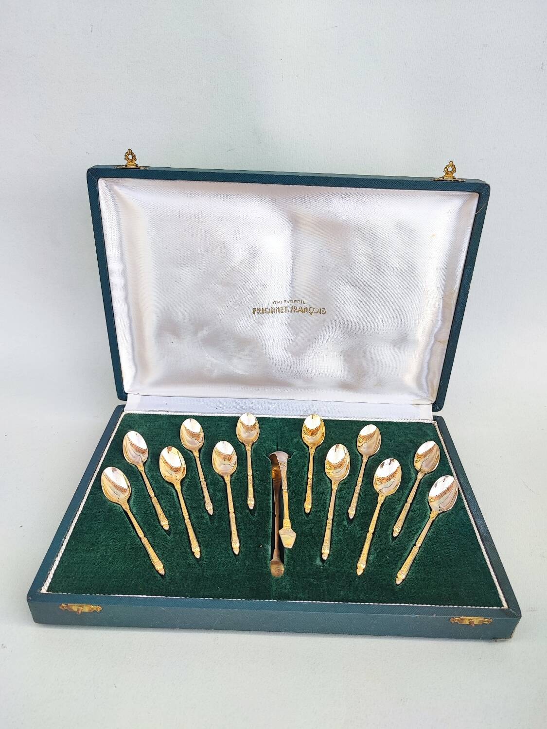 12 gilt metal teaspoons