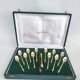 12 gilt metal teaspoons