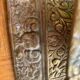 Cellar rat candlestick in gilded brass chised flower pattern, foliage and old face