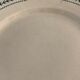 8 flat plates in opaque porcelain from Gien Terre de Fer, model Lauriers, XXth