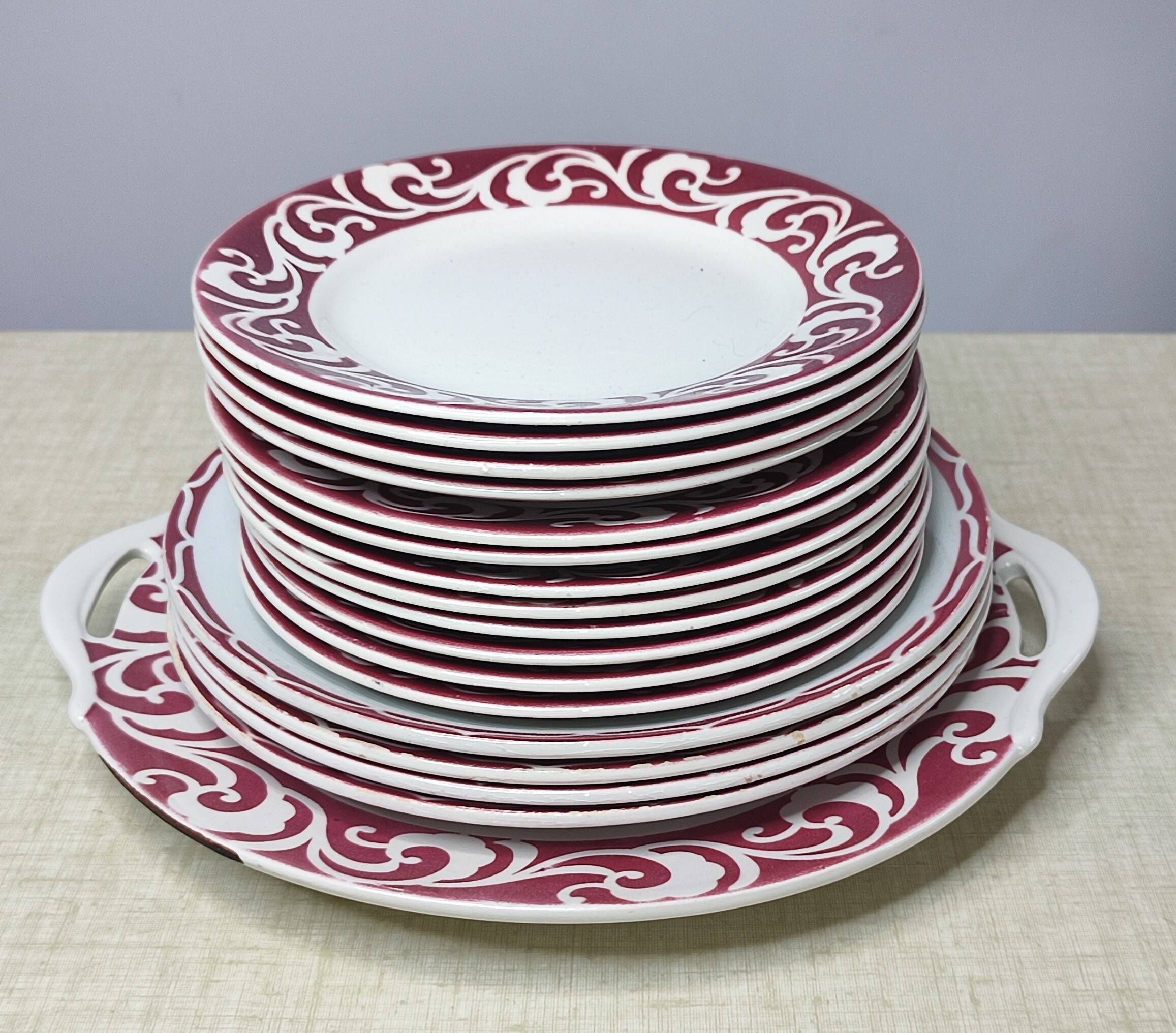 Lot of 17 vintage porcelain plates and a platter from the 1940s