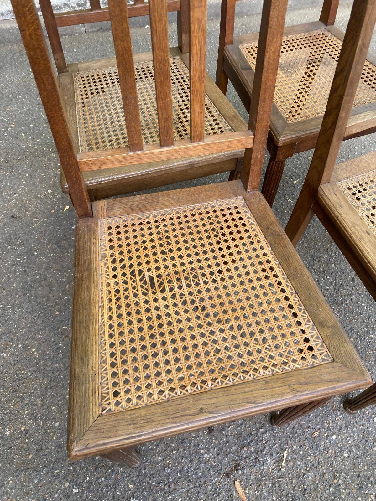 4 Art Deco chairs in solid oak with caning from the 1920s.