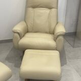 Pair of vintage leather armchairs with ottoman