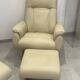 Pair of vintage leather armchairs with ottoman