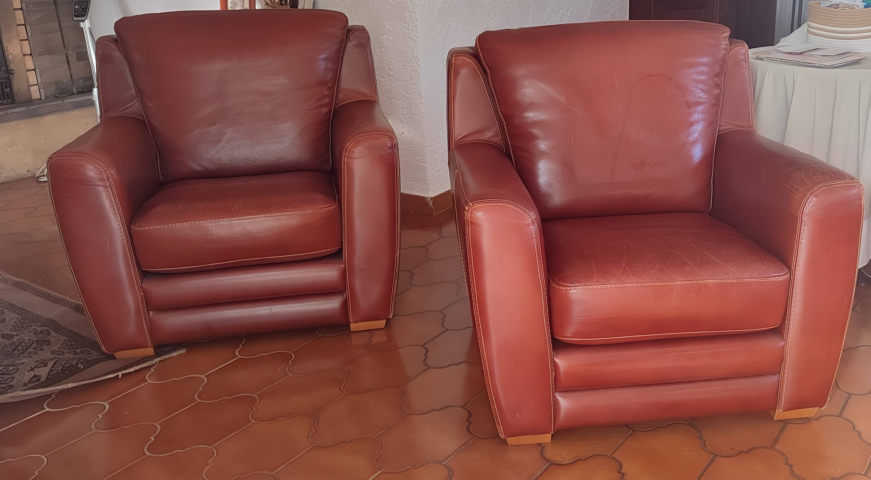 Genuine leather club chairs by Nicoletti, like new.