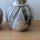 Pair of irman vases in aliometal, french design, 1950