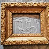 Golden frame in the Bérain Louis XIV style