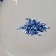 Large antique K&G Lunéville plate, blue floral decoration.