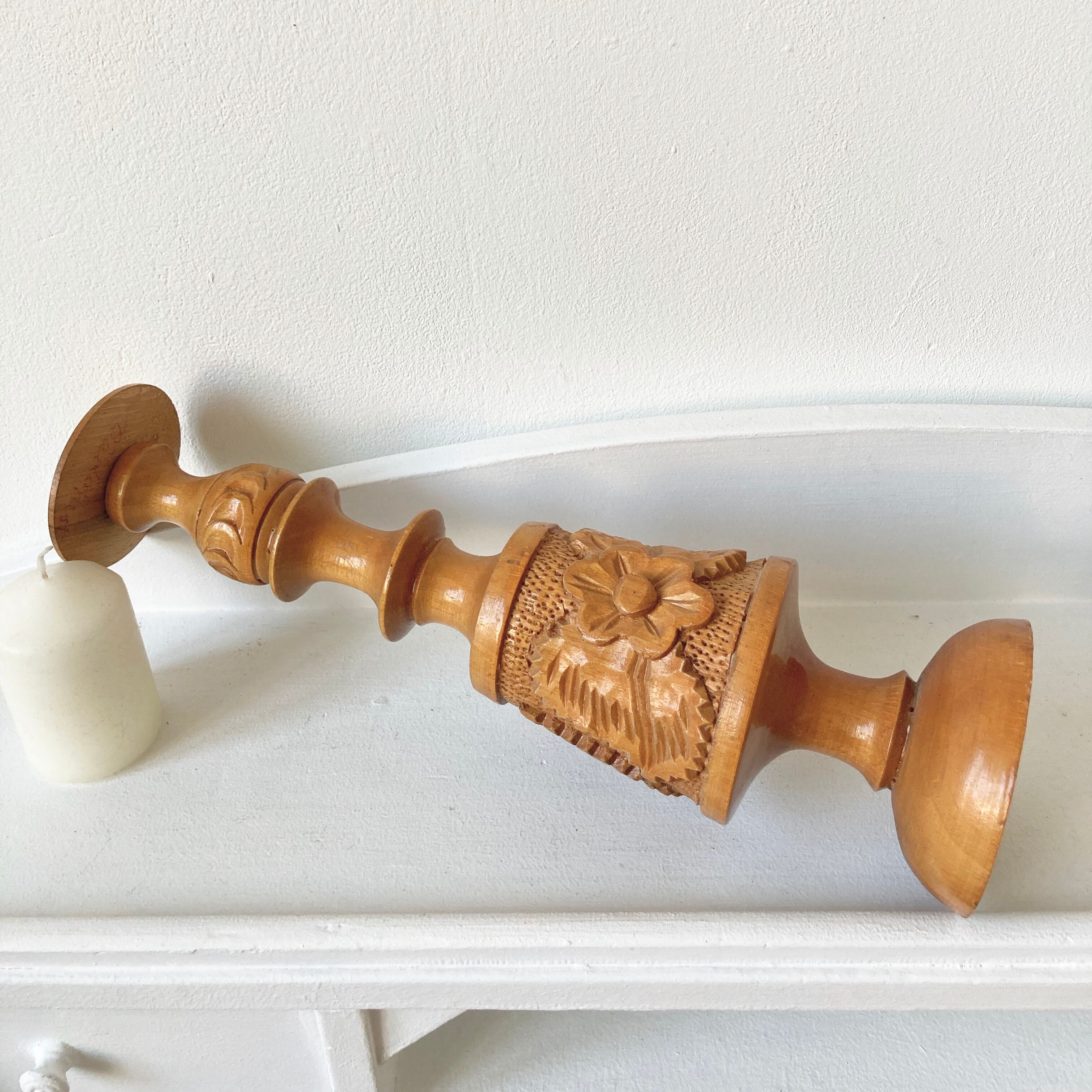 Carved wooden candle holder