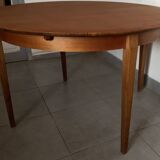 Scandinavian round teak dining table from the 60s extendable