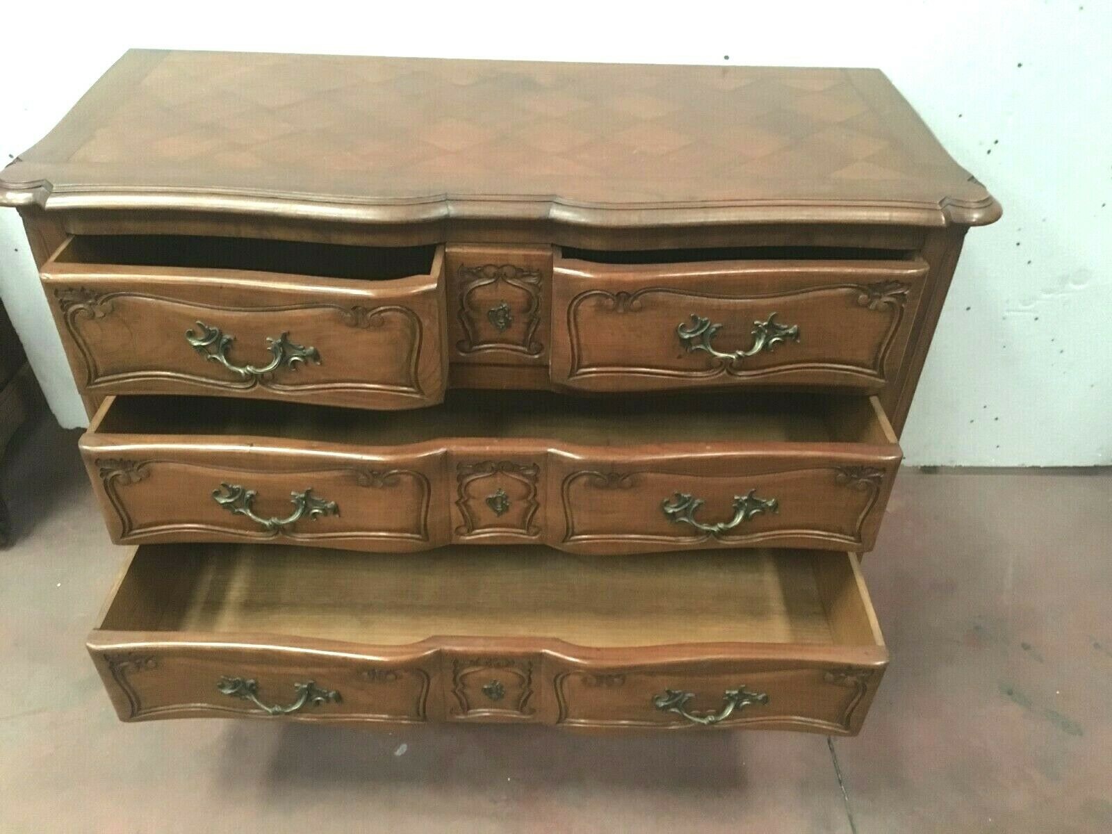 Three walnut drawers chest
