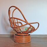 Rattan armchair, reclining and swivel, 70s