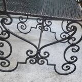 Pair of black wrought iron armchairs