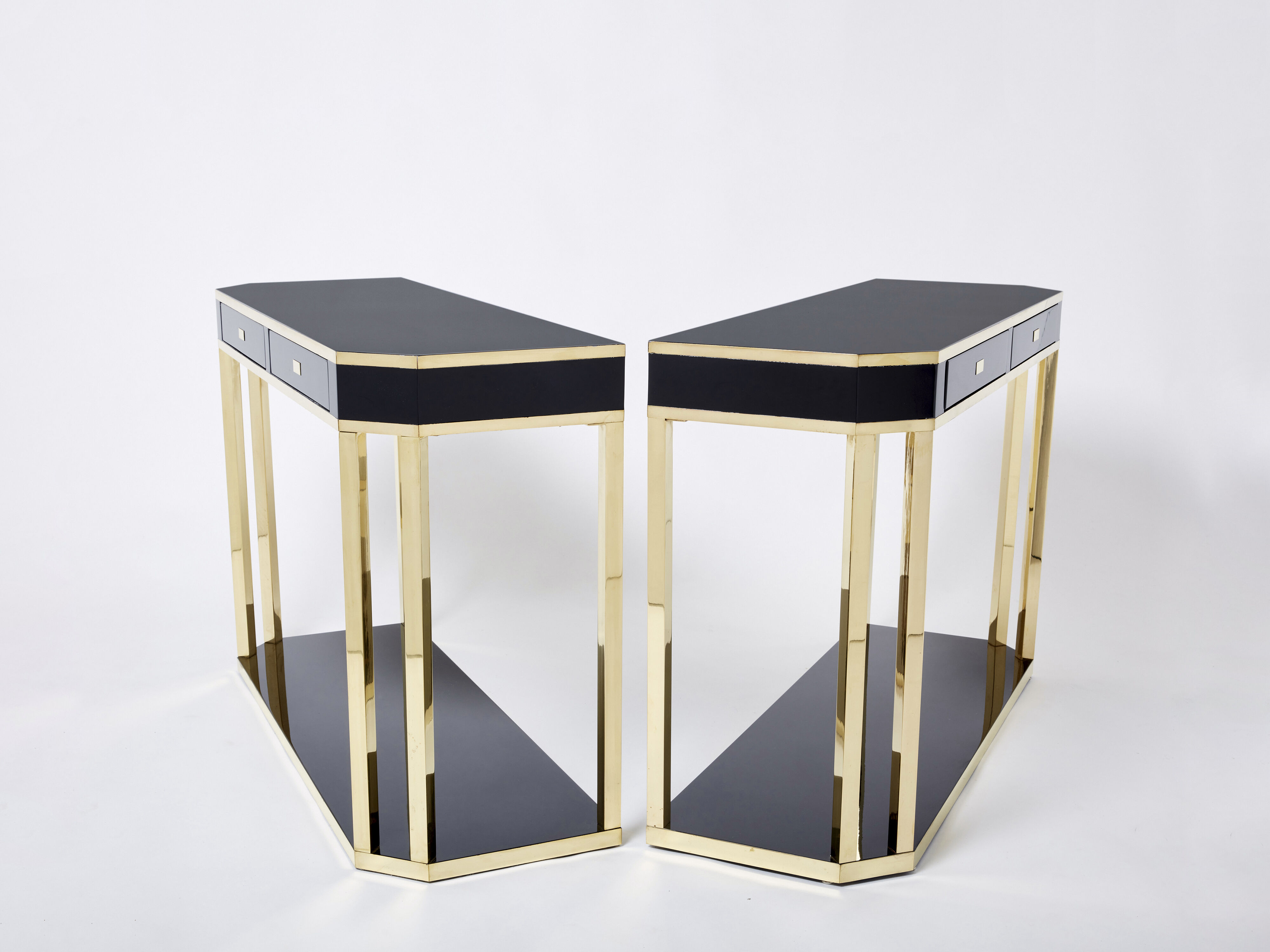 Pair of black lacquered consoles and brass 1970