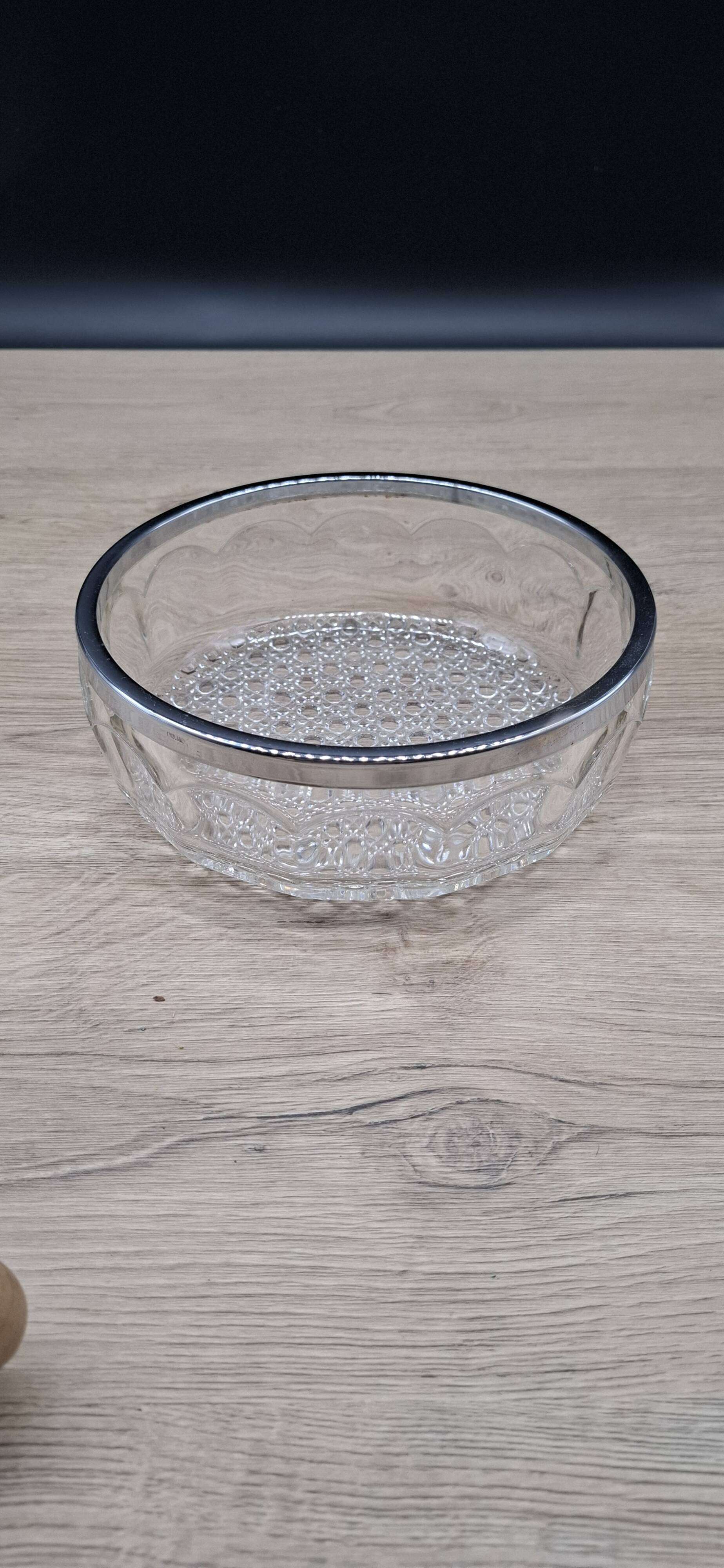 Chiseled glass salad bowl with metal rim