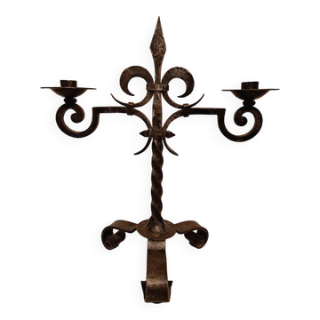 Black wrought iron fleur-de-lis candlestick