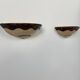 Pair of vintage wall sconces, beige and brown porcelain, France, 1960.