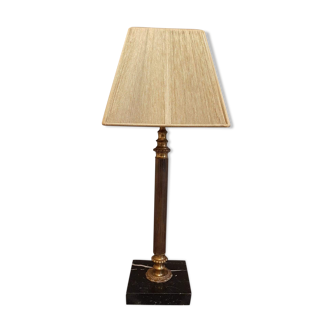 Old brass column and marble base table lamp
