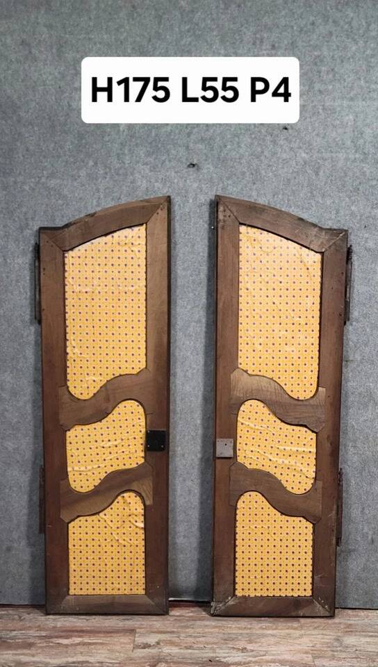 Pair of Louis XV period molded doors in solid walnut