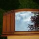 Low mirror in a carved wooden art-deco 1930 112x36cm