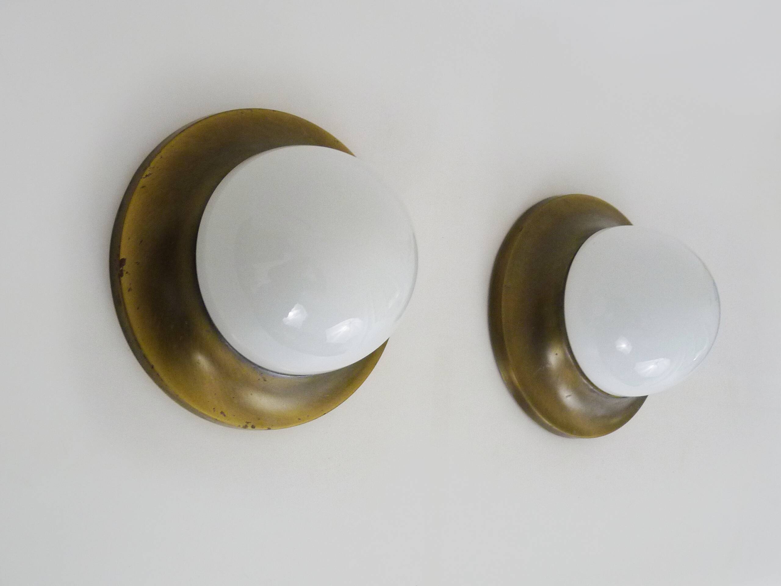 Pair of Space age wall lights made in Austria, Opaline gold metal. UFO