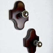 Pair of geometric Art Deco wall lights, carved wood, France, 1960s