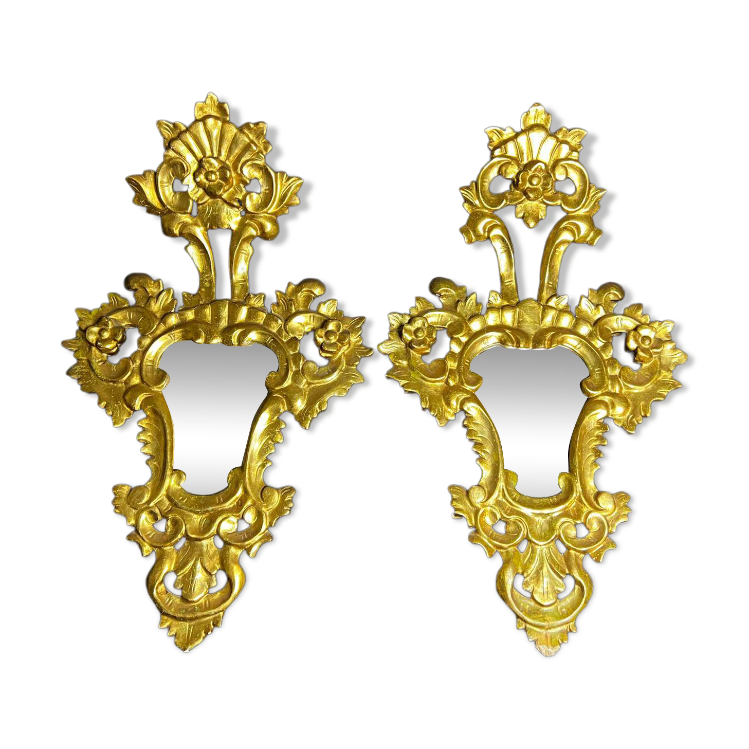 Pair of carved and gilded wooden mirrors, Italian Baroque style, 19th century.