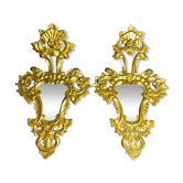 Pair of carved and gilded wooden mirrors, Italian Baroque style, 19th century.