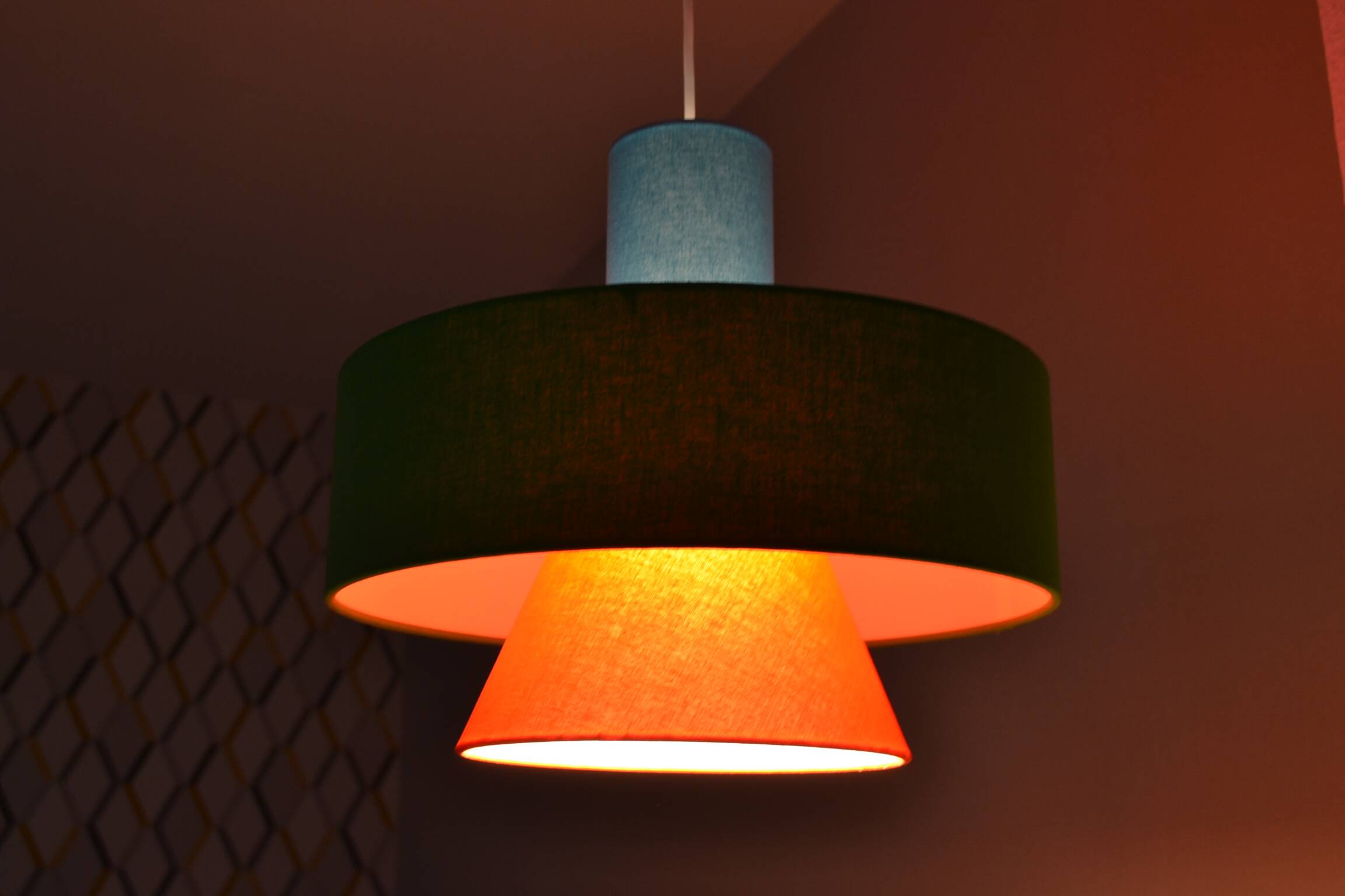 Gravity pendant lamp - sleek design in coloured fabric