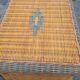 Pair of rattan bedsides