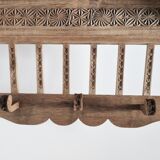 Old carved wood wall shelf