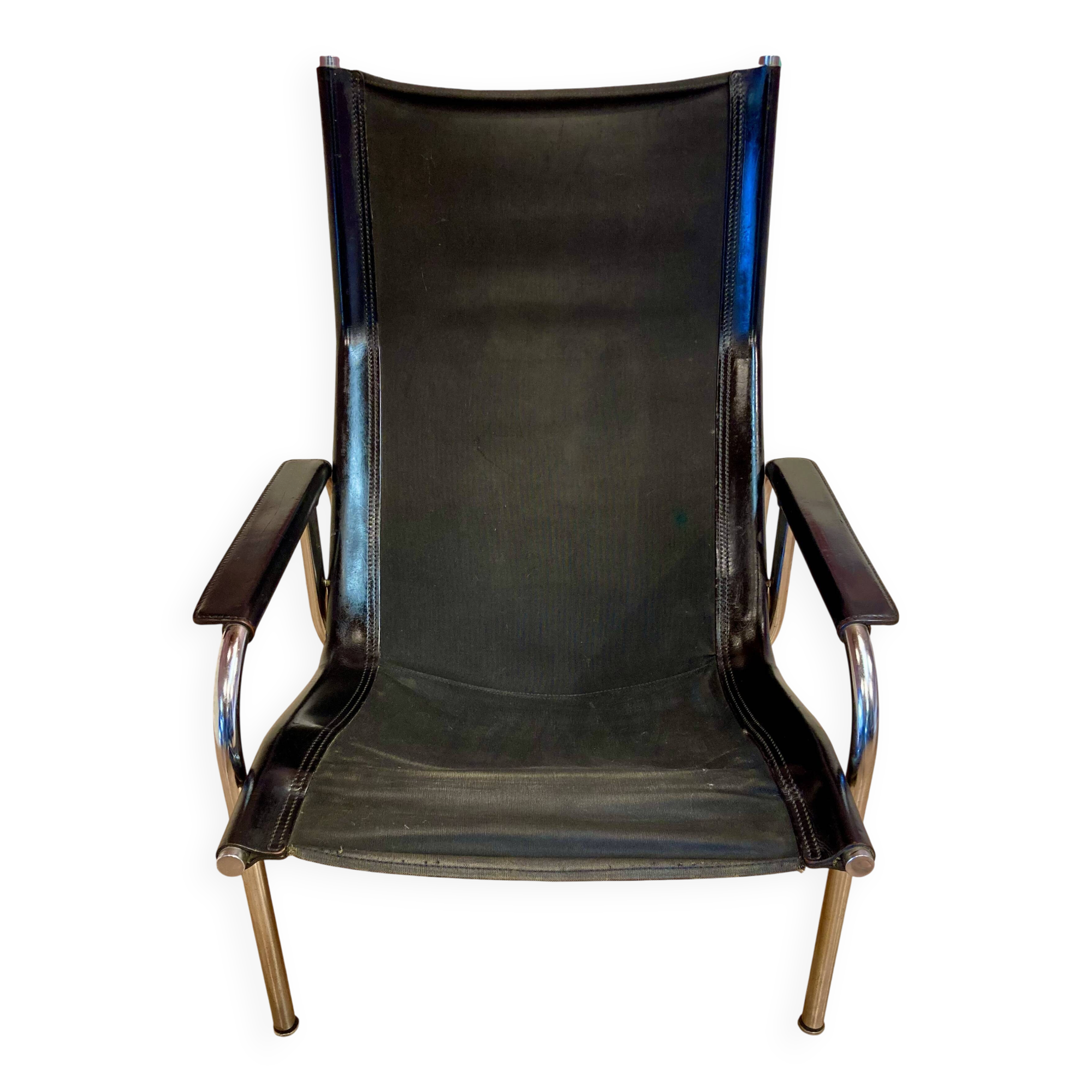 Reclining armchair in black leather and chrome design "hans eichenberger" 1960.