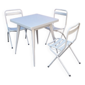 Table tolix, design indus, et ses 3 chaises pliantes, dessinés par xavier pauchard