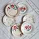 Old mismatched earthenware dessert plates
