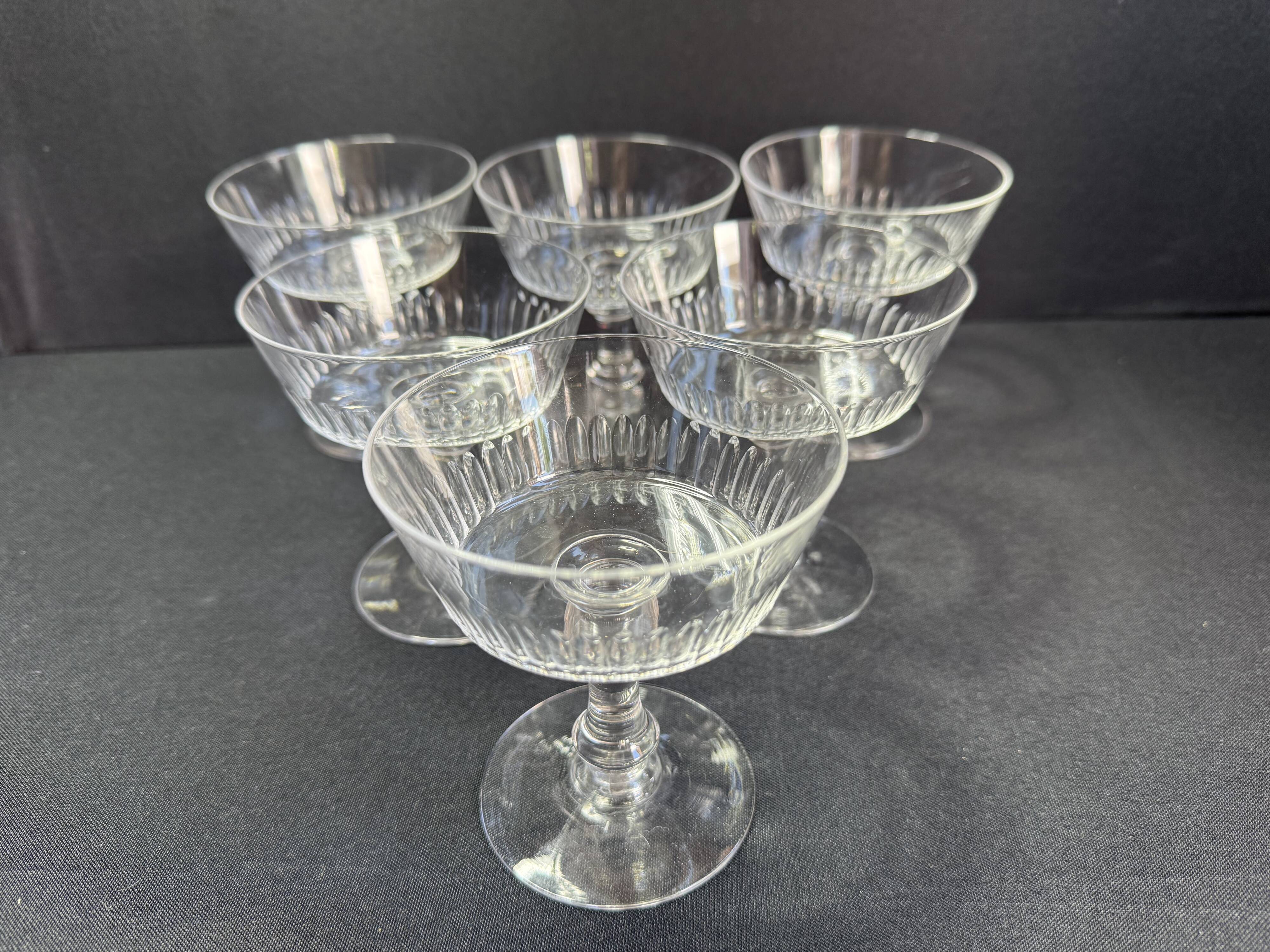 6 Baccarat coupes with small hollow stems