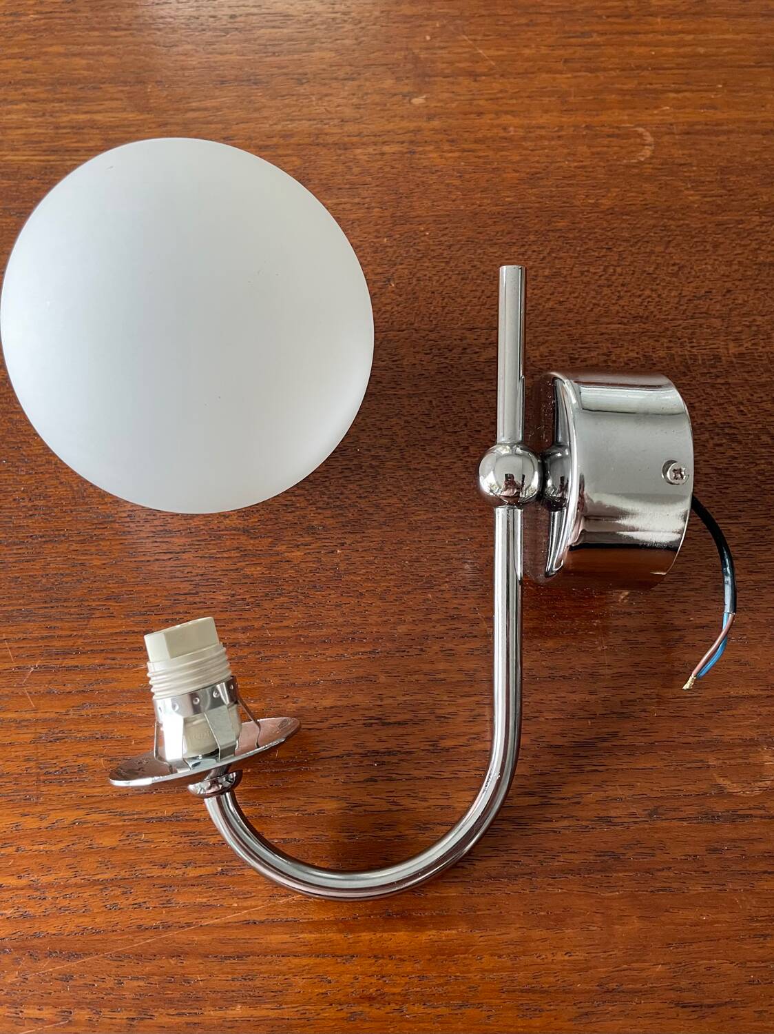 Chrome metal wall light and opaline ball