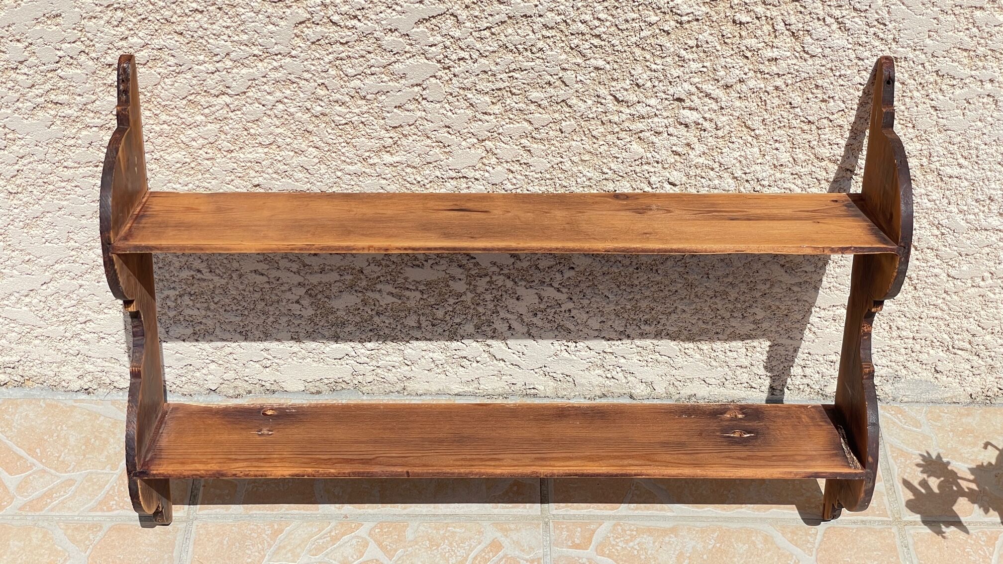 Old wall shelf in wood