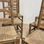 Set of 6 vintage wooden ladder-back dining chairs with woven seats, 20th century, 105 × 38 cm