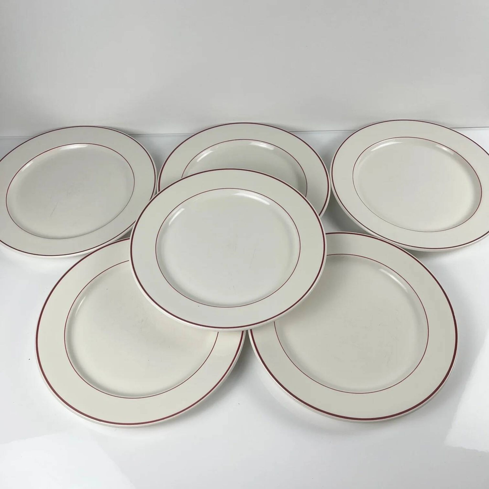 Set of 6 flat plates Villeroy & Boch, burgundy/purple rim, 20th century.