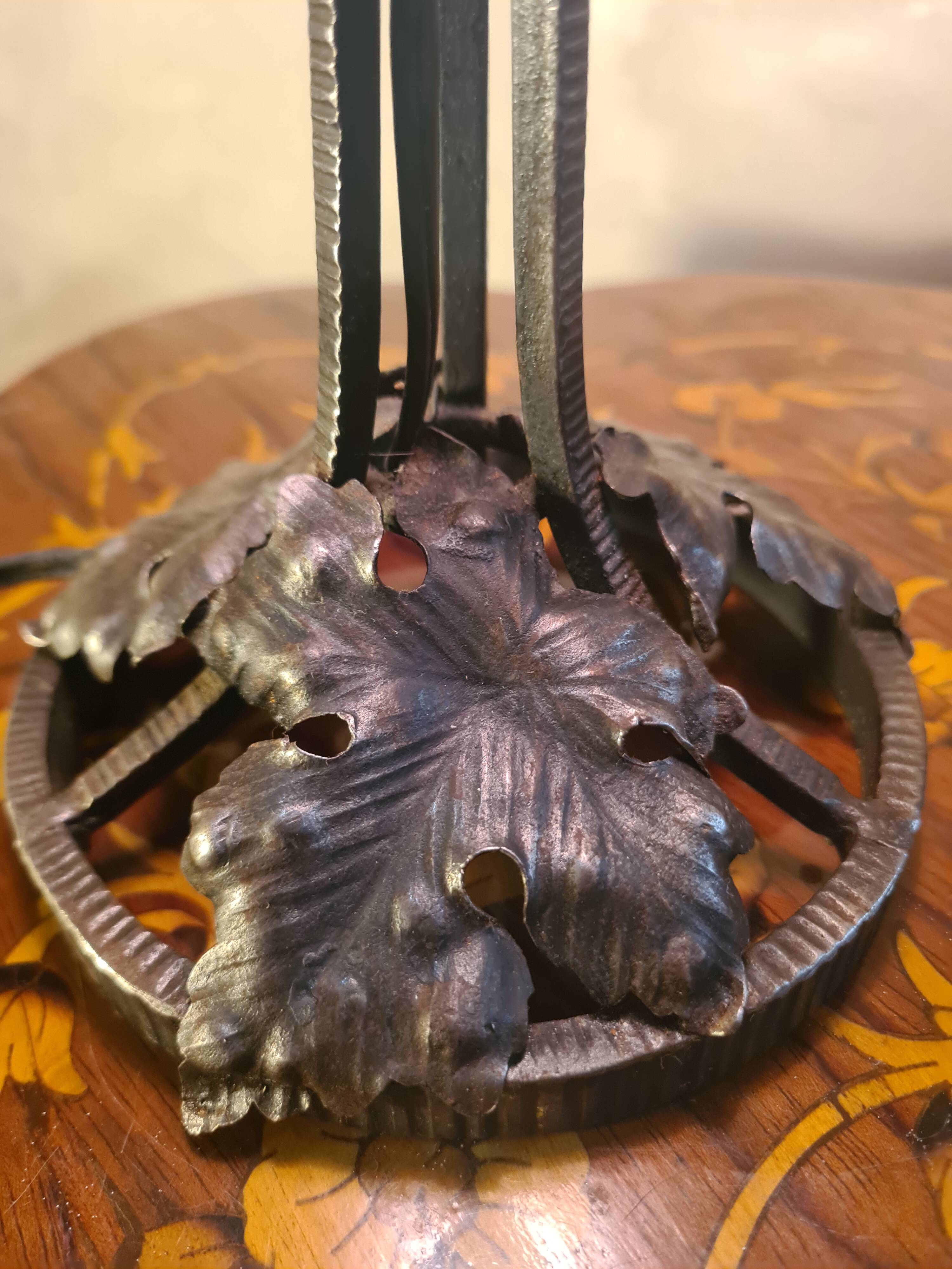 Antique wrought iron floor lamp, 1900, with a glass shade, 40x15.