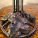 Antique wrought iron floor lamp, 1900, with a glass shade, 40x15.