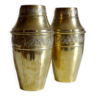 Duo of art deco embossed brass vases