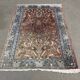 Handmade wool Iranian carpet - 1.65m x 1.07m.