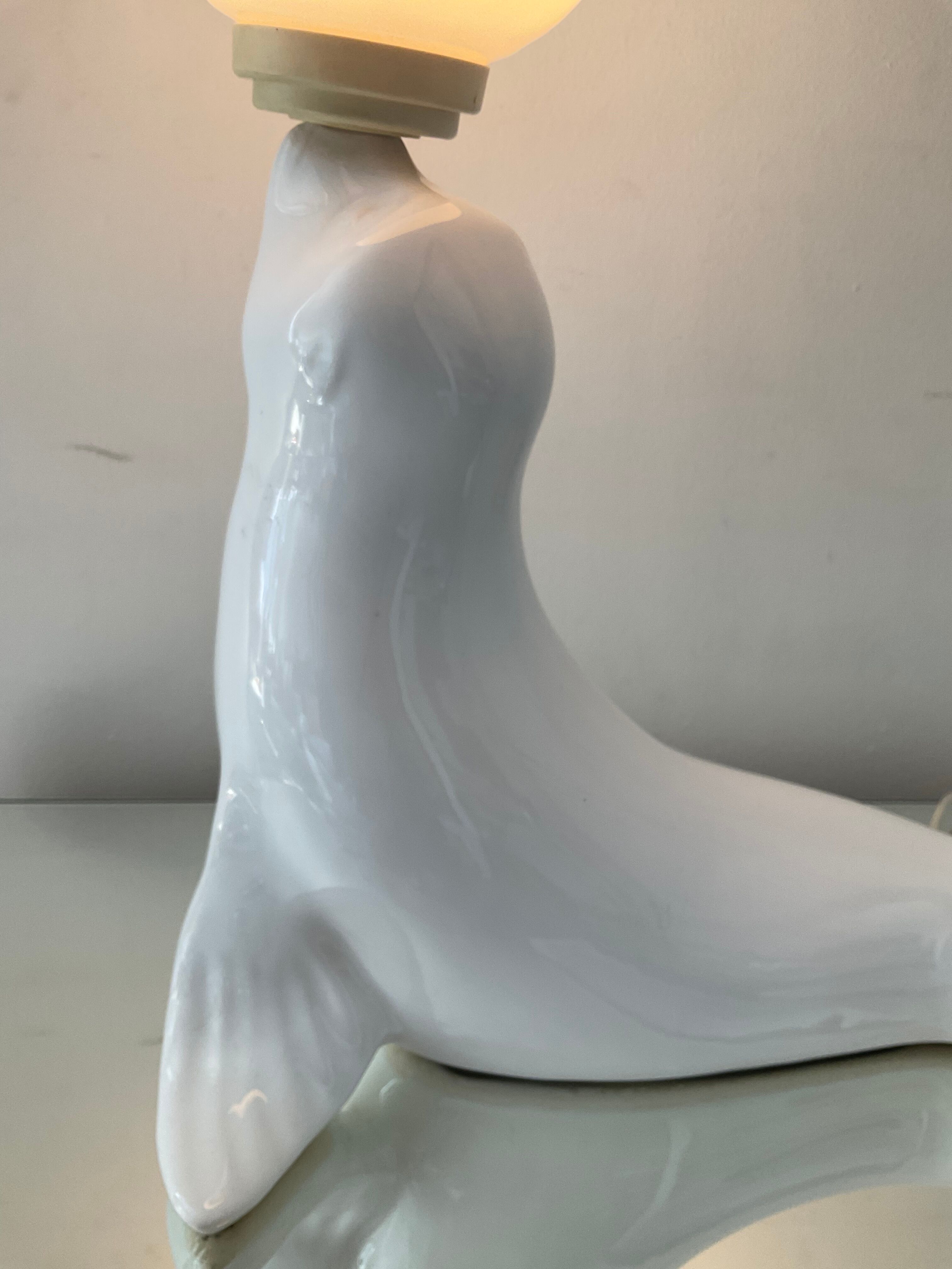 Vintage sea lion lamp in ceramic and opaline