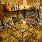 Chrome metal coffee table with a glass top from the 1970s.