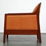 Fauteuil design artdeco en cuir de vache. grand confort et détails uniques