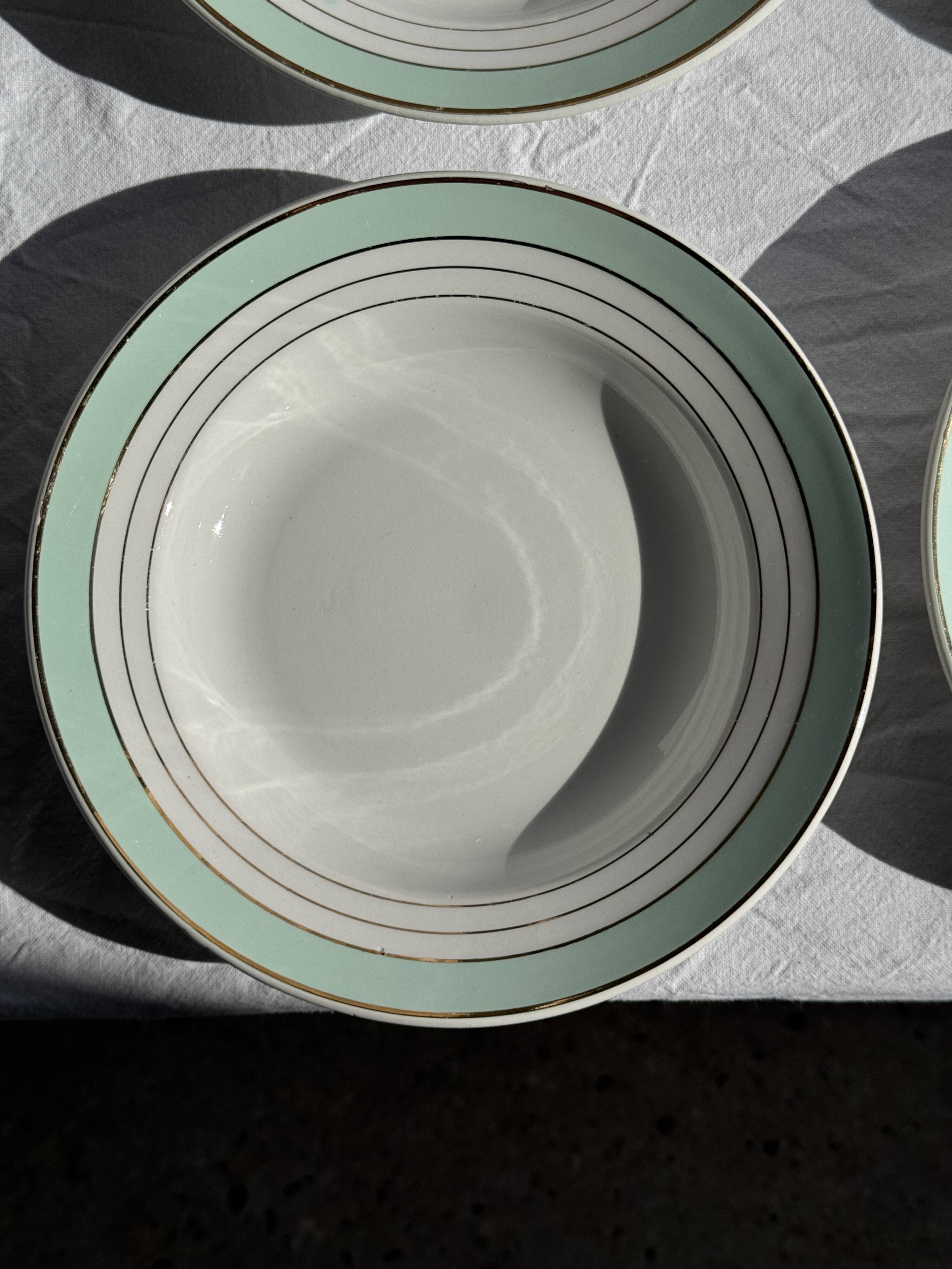 Set of 8 antique turquoise deep plates with a gold rim D22.5