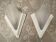 Pair of Art Deco wall sconces in plaster and pressed glass.