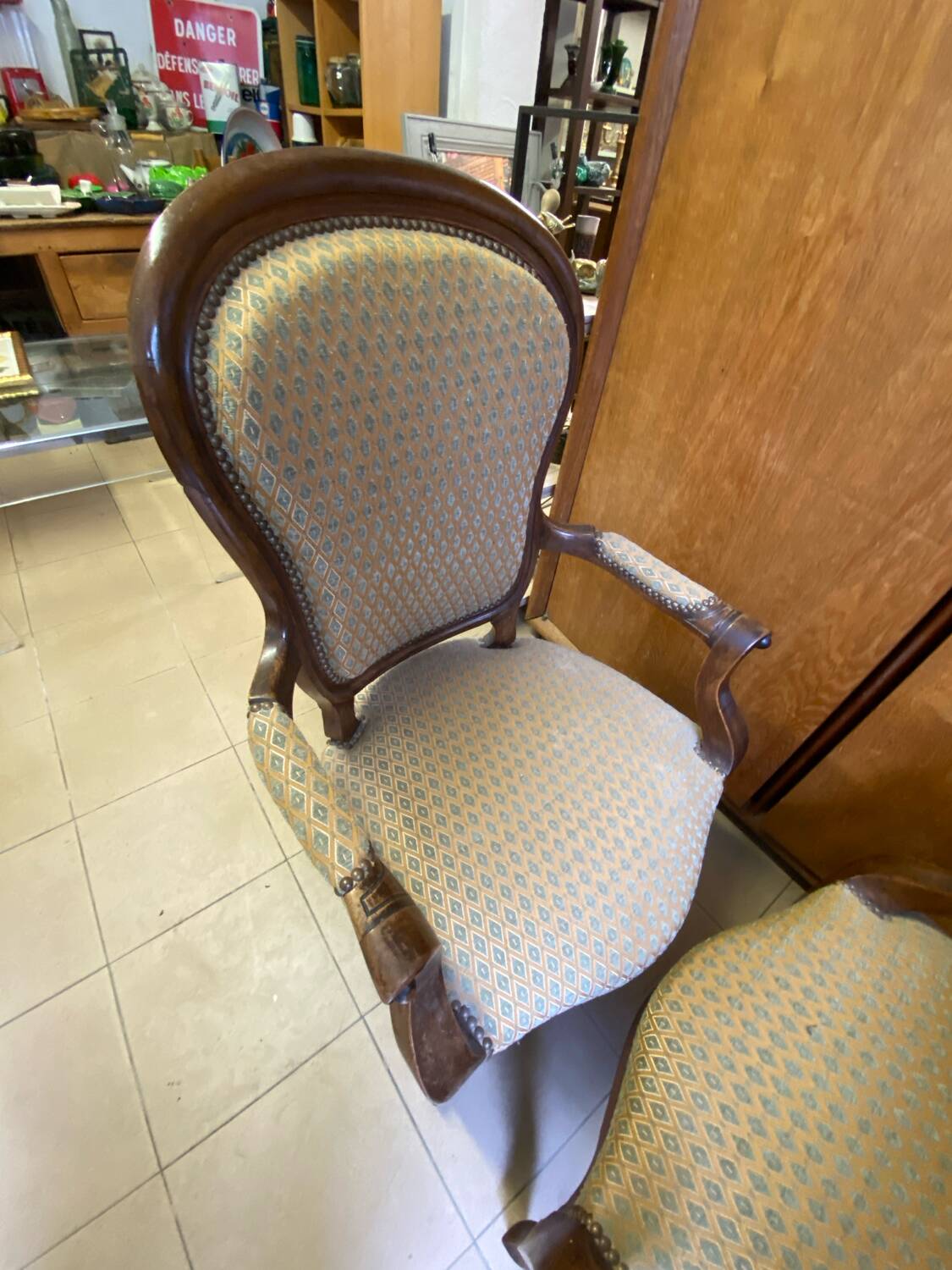 Two Louis XV style wooden and fabric armchairs